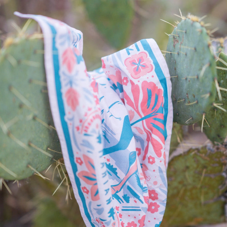 a Darling Scarf hanging from a cactus plant, Shop Marian.